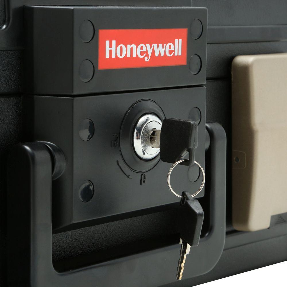 0.24 cu. ft. Molded Fire Resistant and Waterproof Portable Chest with Carry Handle, Key and Double Latch Lock